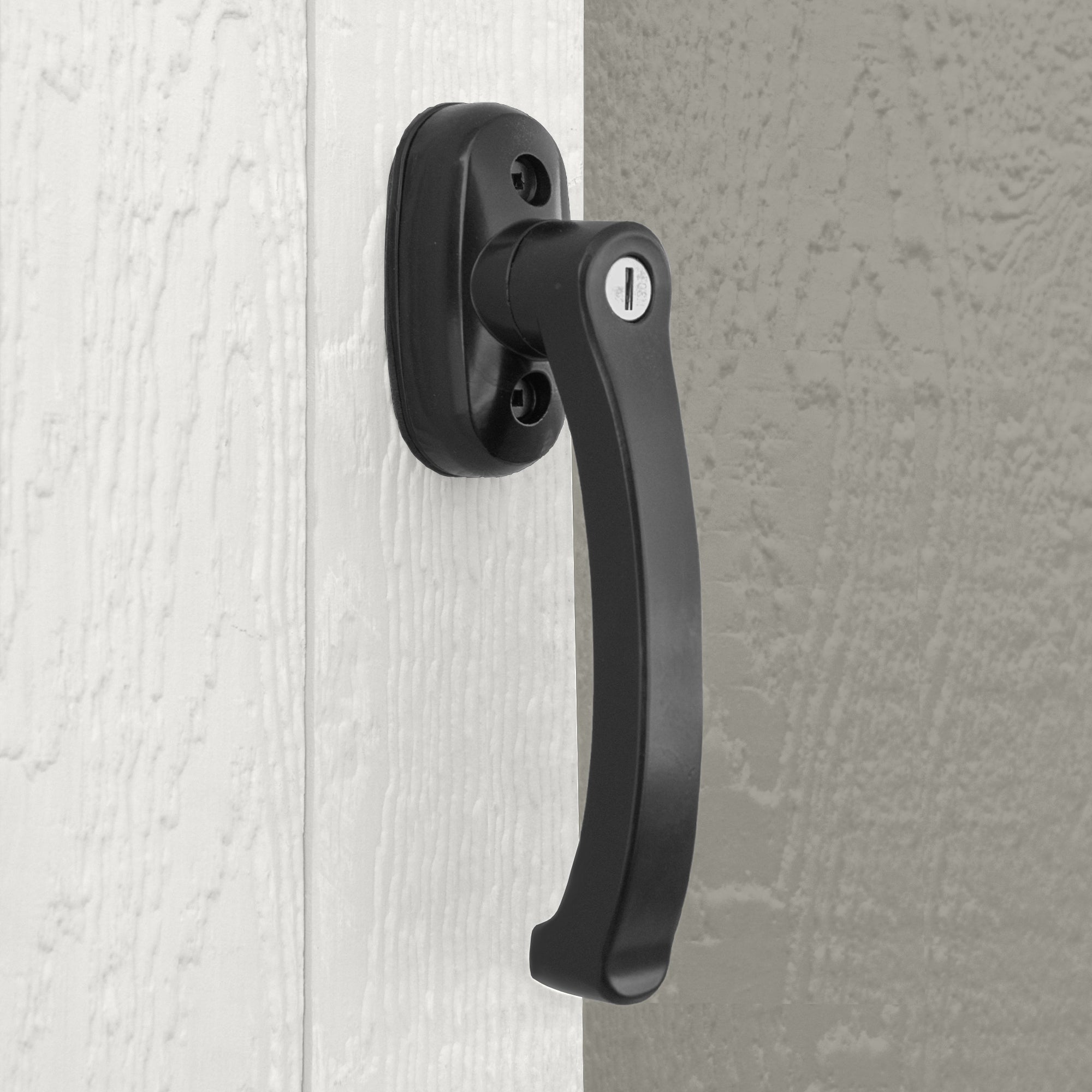 Close-up of the wooden shed handle, designed for easy and secure door operation