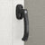 Close-up of the wooden shed handle, designed for easy and secure door operation