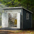 Modern shed with organized bike storage, a hanging rack for gear, and a clean interior design