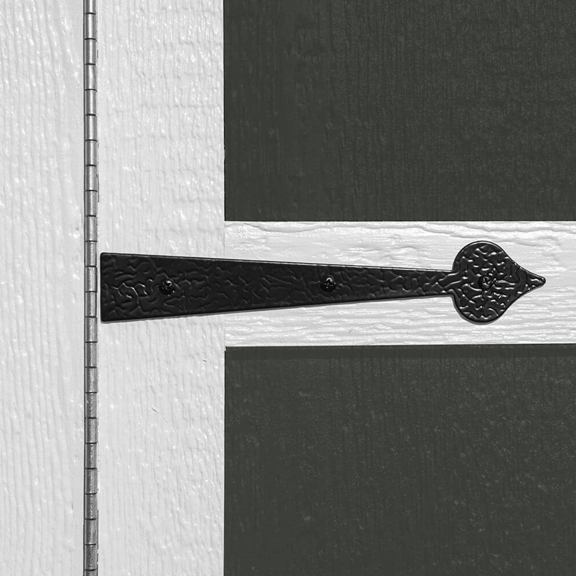 Close-up of the decorative hinge and latch hardware on the Classic Deluxe 8x12 shed door