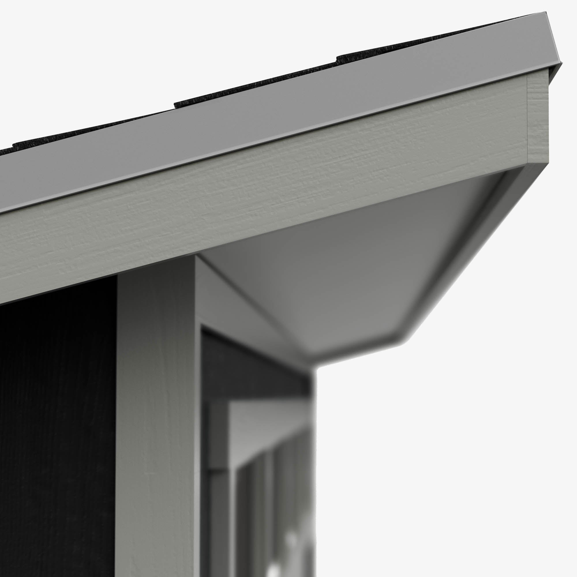 Close-up of a contemporary shed's metal roof with sleek overhang and modern trim detailing.
