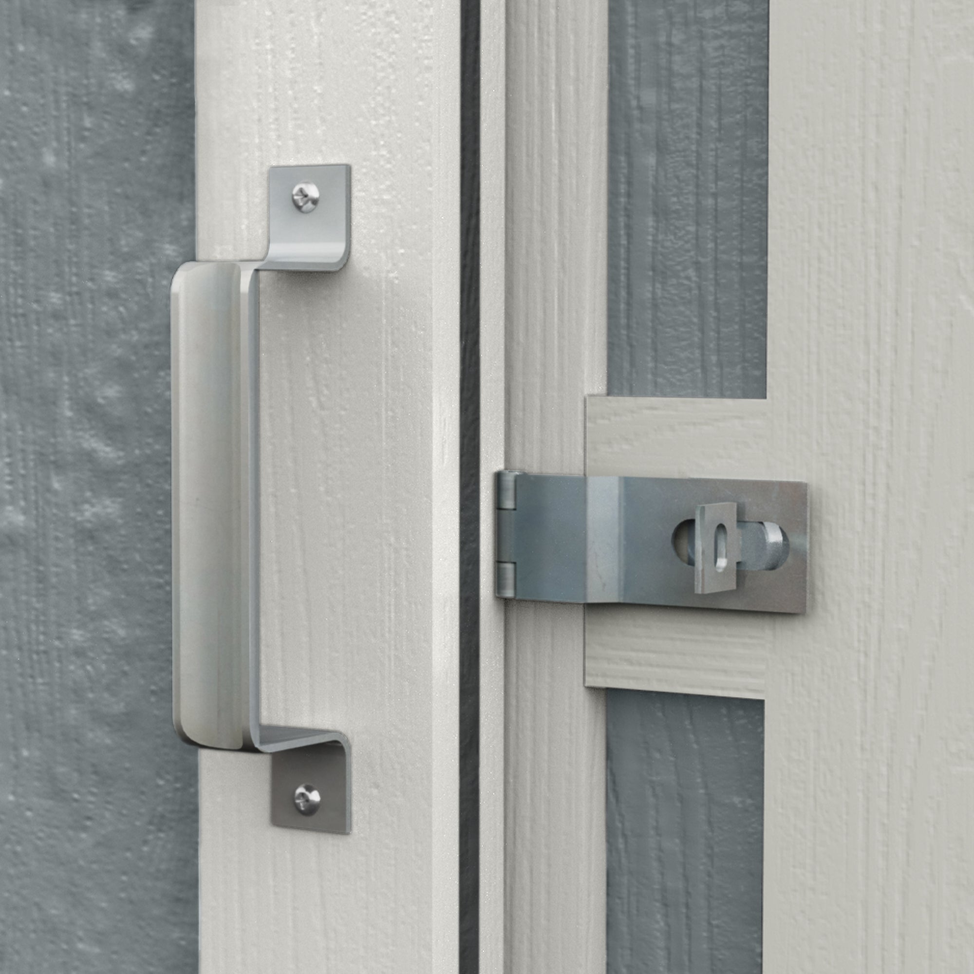 Close-up view of the handle on the sliding door of a 10x4 lean-to shed