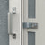 Close-up view of the handle on the sliding door of a 10x4 lean-to shed