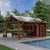 Stunning backyard with covered patio and shed bar attached