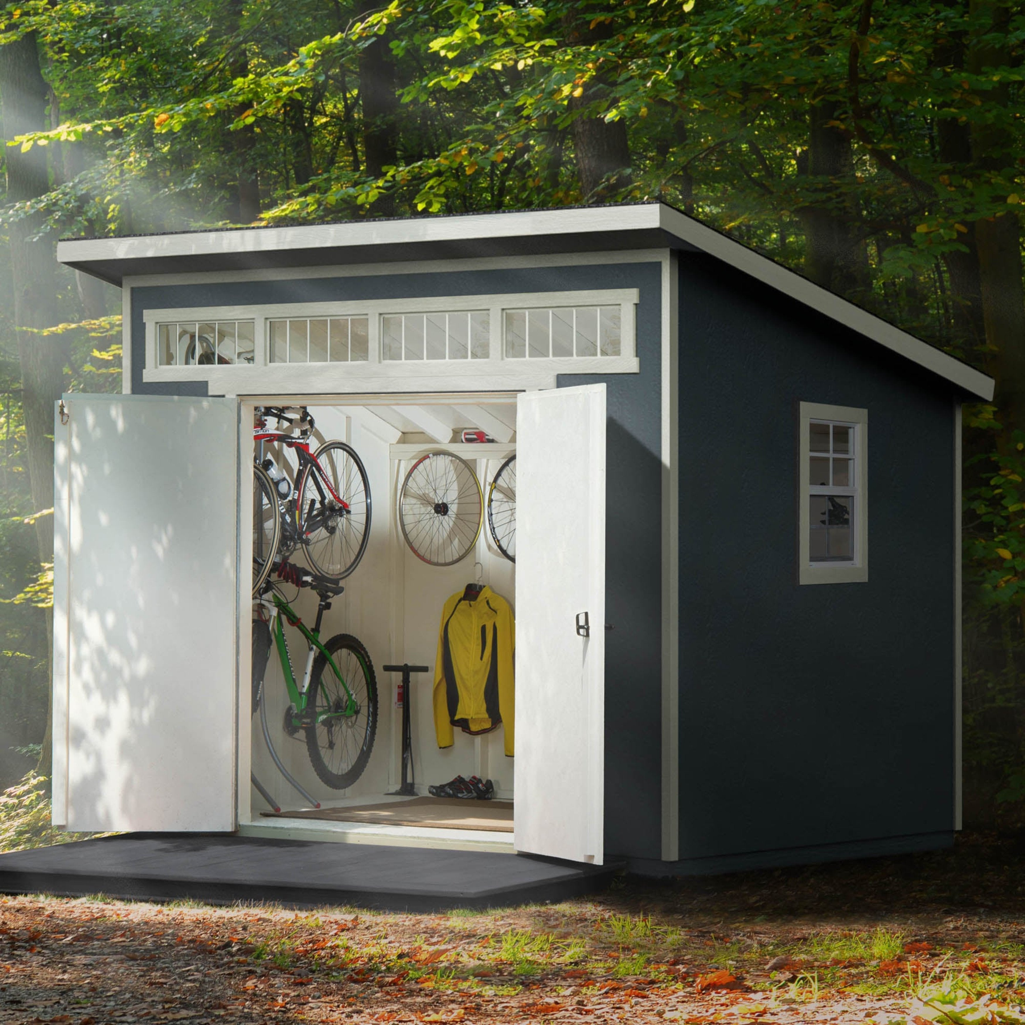 Modern shed with organized bike storage, a hanging rack for gear, and a clean interior design