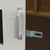 Close-up of the sliding barn door pull handle on a Contempo contemporary shed