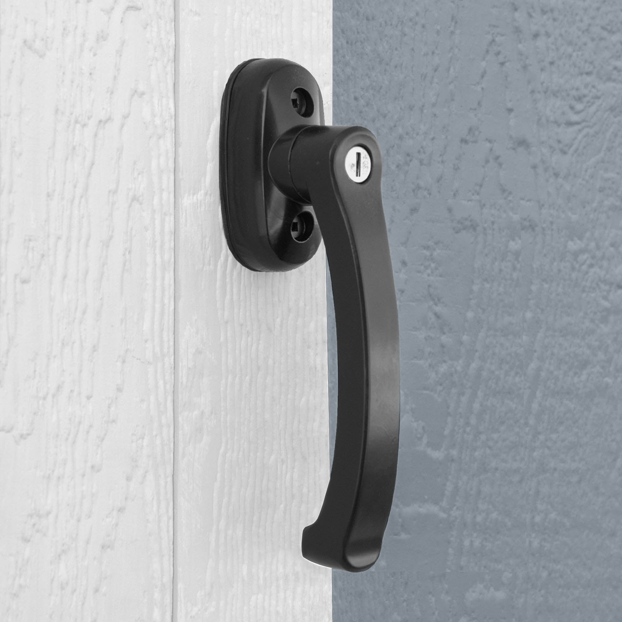 Close-up of the wooden shed handle, showcasing its durable design for easy and secure door access