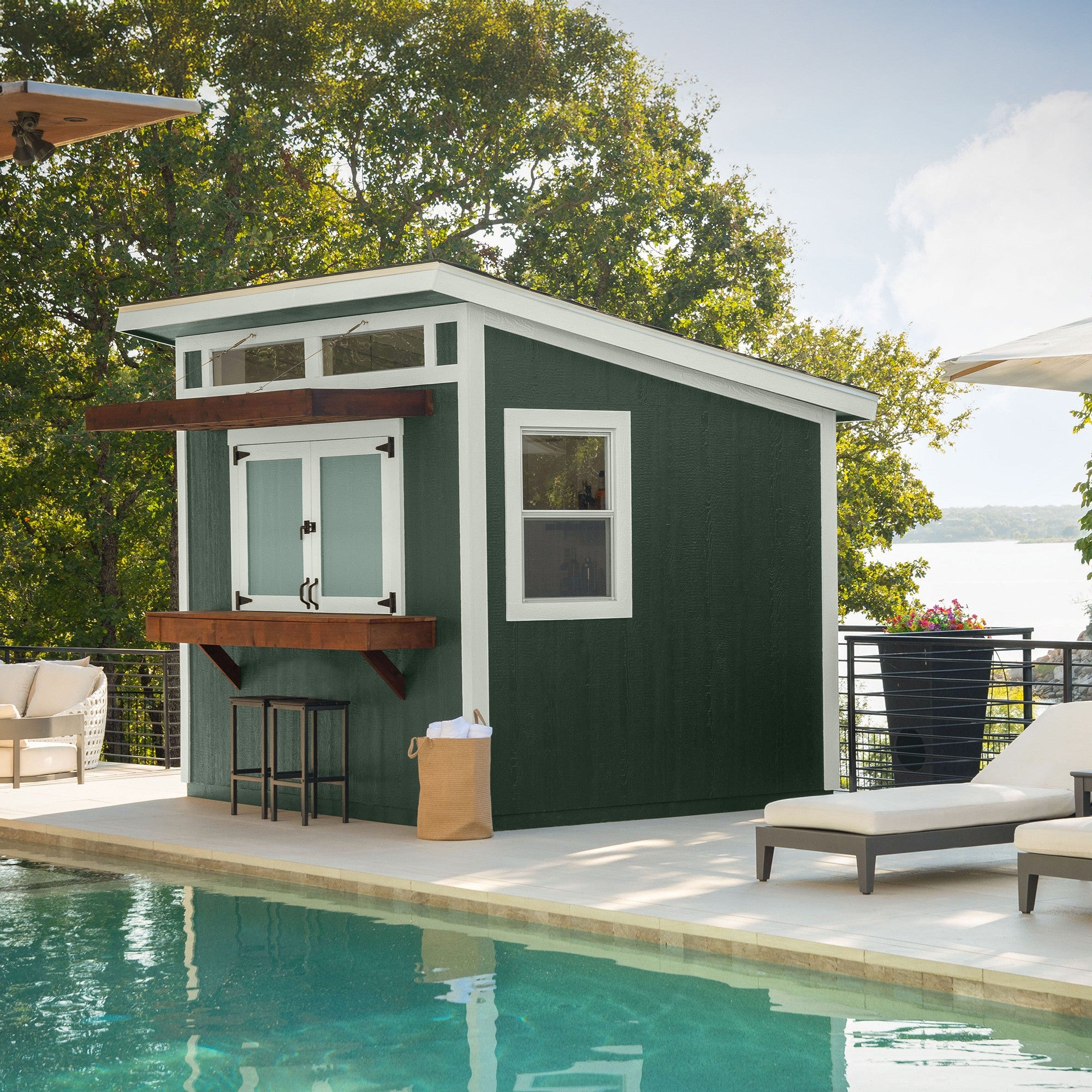 Pentwater Bar Shed by the pool with open window and bar countertop, perfect for outdoor entertaining