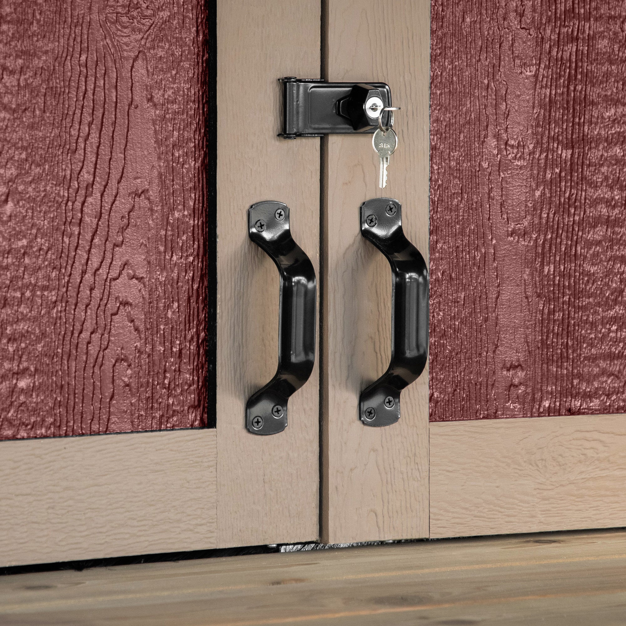 close up of the handles and locks for the bar doors 