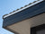 Close-up of Contempo shed featuring a sleek metal roof with clean, modern lines