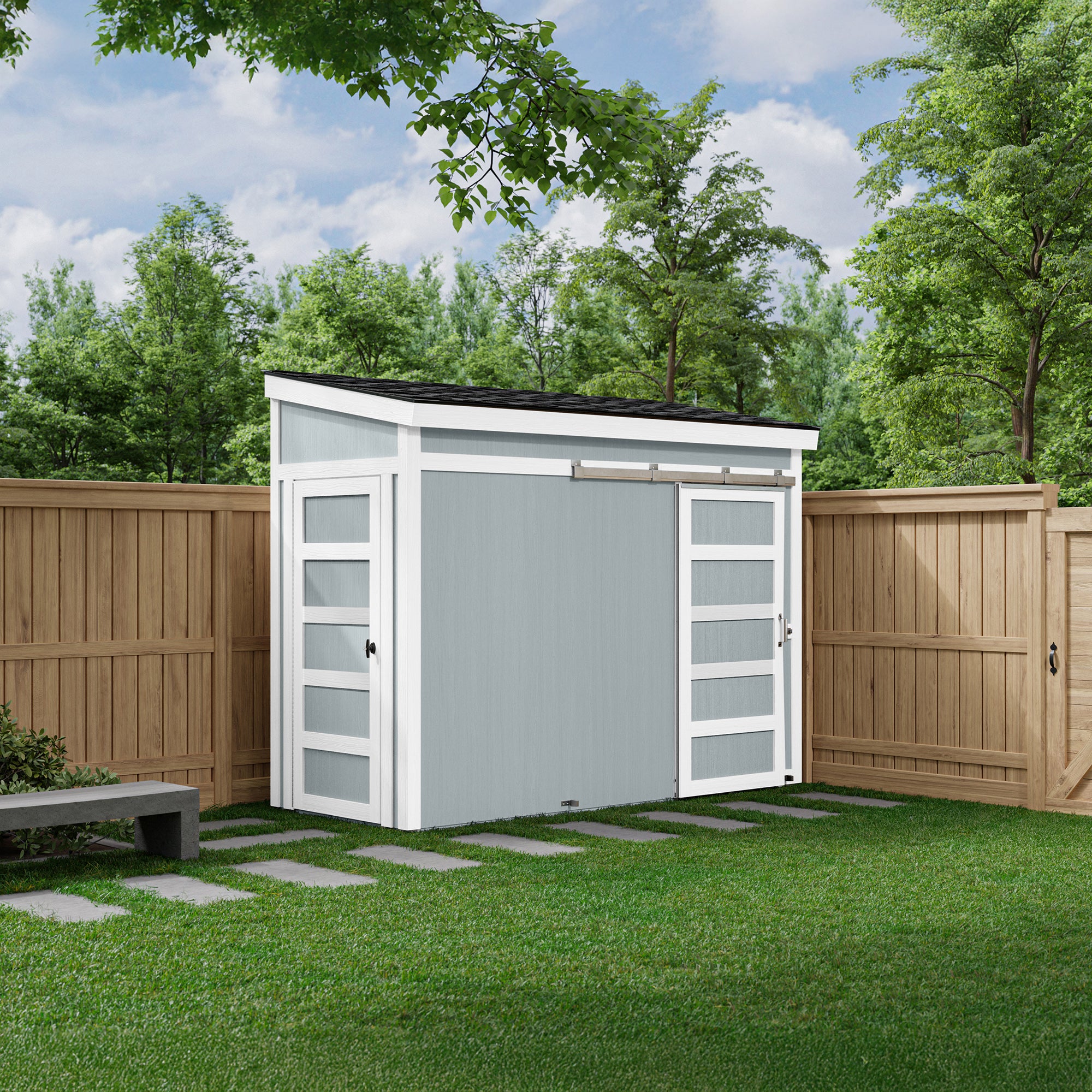 Dayton lean to shed by fence in corner of backyard
